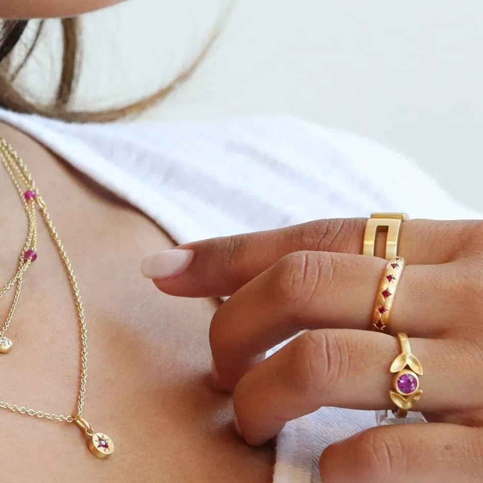 20K Gold "Laurel" Ring with Bezel-Set Pink Sapphire Center